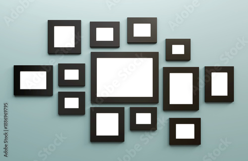 Many empty picture frames on the green wall