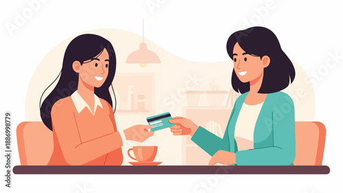Two women seated at a table, one passing a credit card to the other
