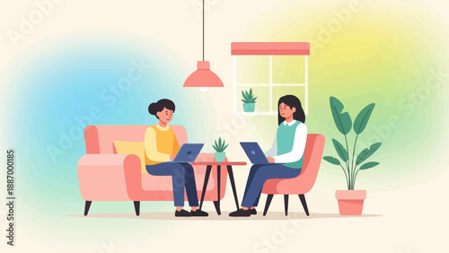 Two women working on laptops in a cozy living room setting