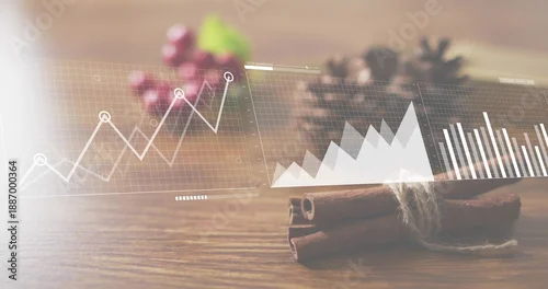 Fototapeta Showing tied cinnamon sticks twine lying on wood table pinecone berries charts overlay, copy space
