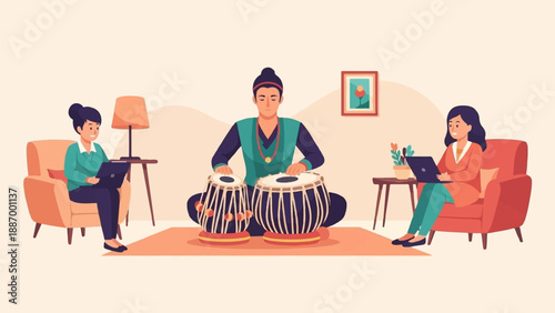 Two women work on laptops while a man plays the tabla drums