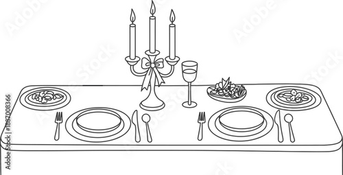 Elegant candlelit dinner setting with plates, cutlery, and candelabra on a long table