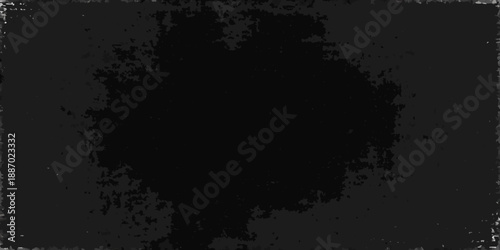 A stark completely black image with undefined shape and texture