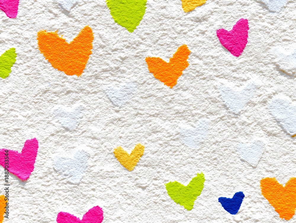 Fototapeta premium Colorful terracotta heart pattern on a pure white background