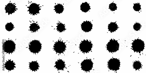Abstract arrangement of irregular black ink blots on a white background