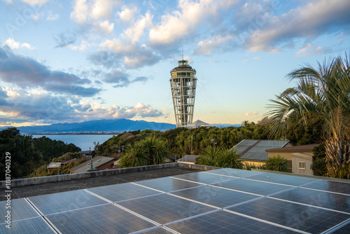 Enoshima Sea Candle Observation Tower with Solar Panels and Coastal Landscape in Japan