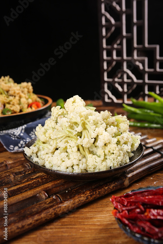 Obraz na płótnie Crispy Dried Cauliflower Vegetables from Sichuan Farmers in Traditional Cast Iro