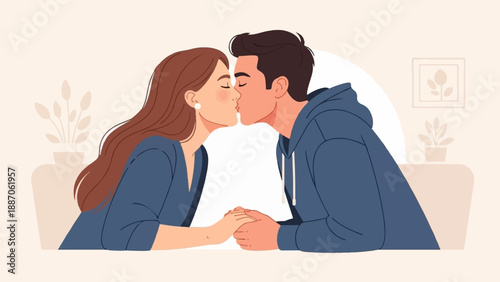 A couple sharing a tender kiss, holding hands indoors