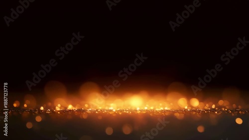 Black background with a gold sparkle