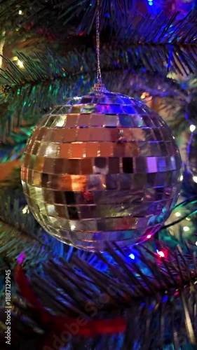 moving disco ball on a Christmas tree
