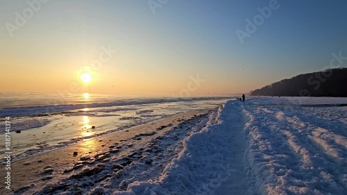 Frozen winter sunrise seascape