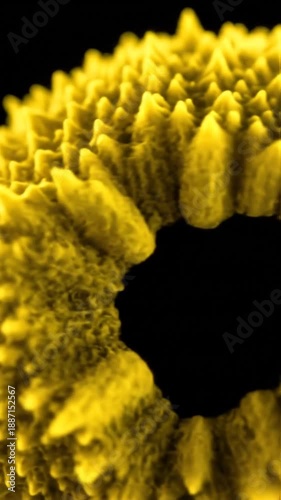 Dynamic Microscopic View Of A Vibrant Yellow Pollen Grain Unveiling Intricate Biological Details