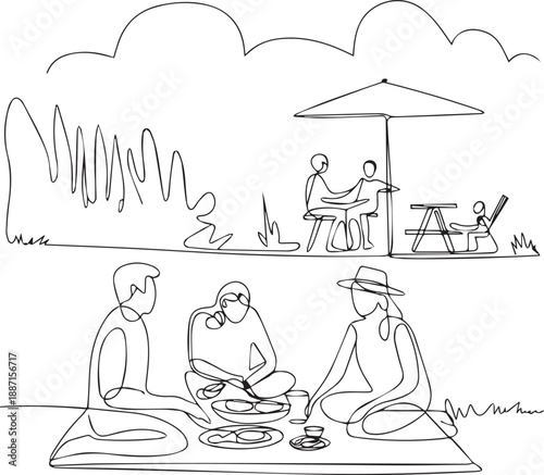 People enjoying a leisurely picnic on a blanket outdoors under a parasol