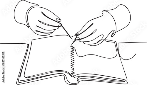 Hands stitching a book with needle and thread on a table