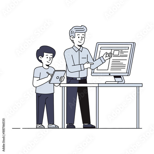 An older man and a young boy working together at a desk with a computer screen