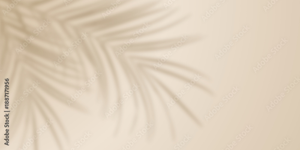 Naklejka premium Palm leaf shadow on beige wall background. Blurred tropical plant leaves shadow beige background. Minimalist nature summer spring background for beauty, cosmetic, skincare, product presentation