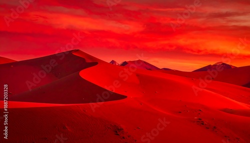 Crimson Desert Dunes - A Fiery Sunset Over the Arid Landscape.