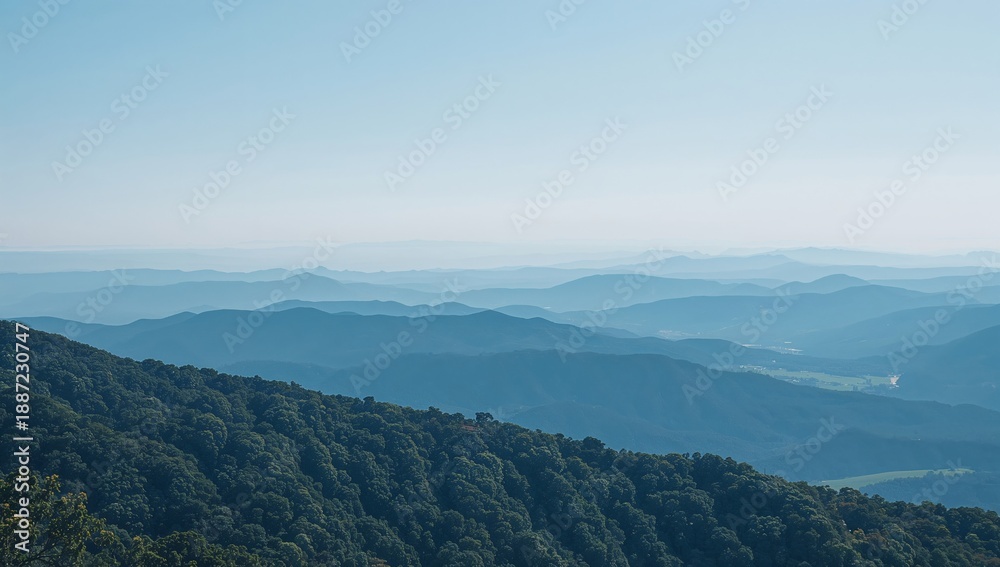 Naklejka premium A Person Stands at a High Elevation, Looking out Over a Vast Mountain Range