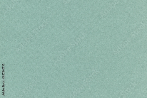 Green color paper canvas texture background. Natural paper surface texture for design. Watercolor rough pattern.