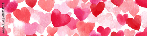 Watercolor hearts creating a seamless pattern in shades of pink and red on a white background. Seamless watercolor heart pattern for Valentine's Day love