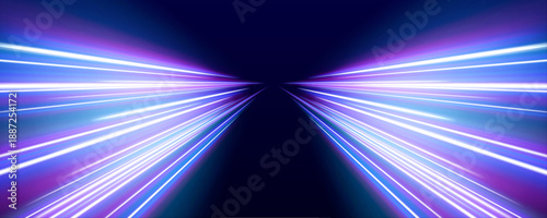 Glowing neon streaks move through a digital cityscape at night. Motion blur creates a cinematic feeling of speed and power. Ideal for technology, travel, and future concepts.