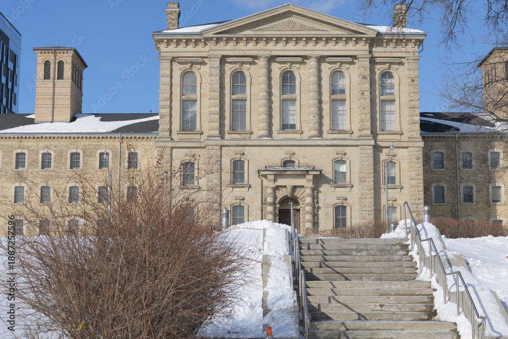 Fototapeta premium main entrance to The Old Don Jail (1864), restored historic wing, now administrative complex of Hennick Bridgepoint Hospital located at 1 Bridgepoint Dr, seen from Gerrard St E, Toronto