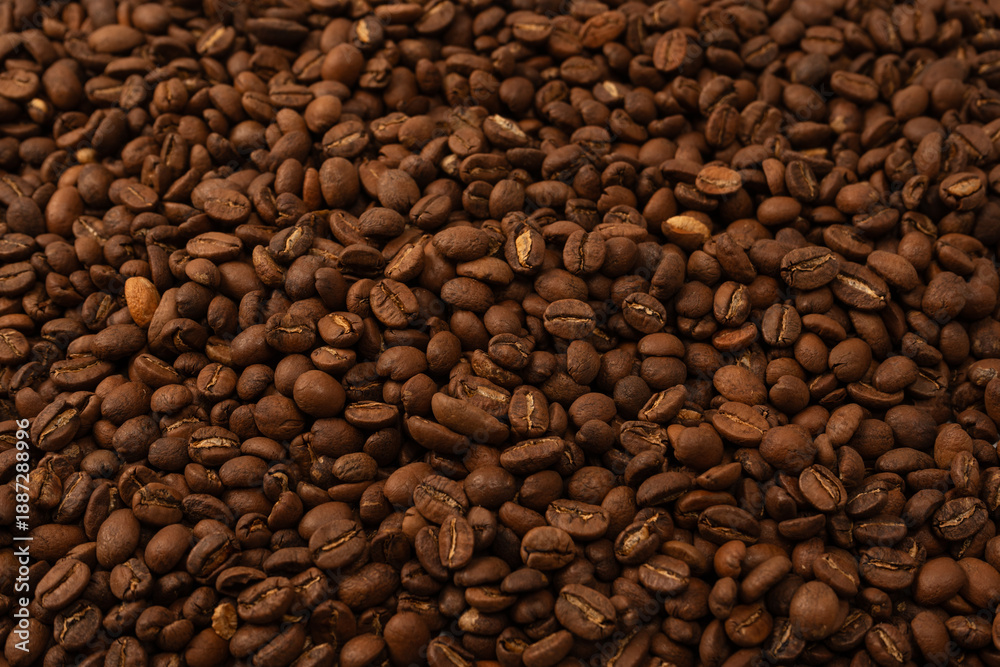 Fototapeta premium Coffee beans on a white background. Coffee beans texture.
