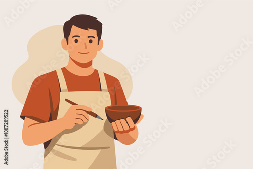 Young caucasian male artist painting pottery in apron