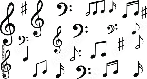 Assorted musical symbols and notes scattered randomly on a plain surface viewed from directly above