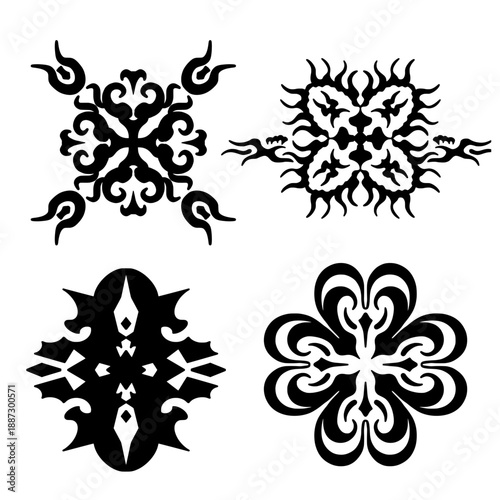 A collection of four bold black symmetrical tribal ornaments featuring abstract floral and flame-like patterns. The designs appear ornamental, mystical, and decorative.