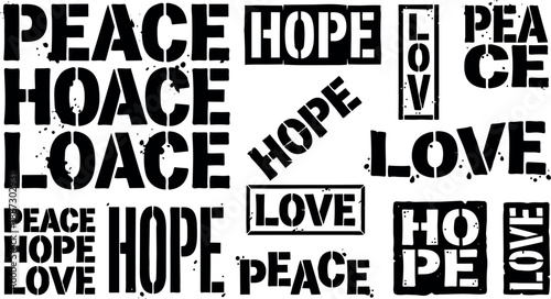 Stencil grunge collage of peace hope love words in varied stamp layouts close up on white background with ink splatter marks