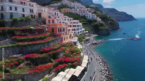 Stunning coastal town with colorful buildings and beautiful ocean views on a sunny day.