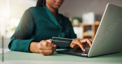 Credit card, laptop and hands of woman in office for financial payment, internet banking and investment. Typing, corporate and person on computer for purchase, business transaction or company expense