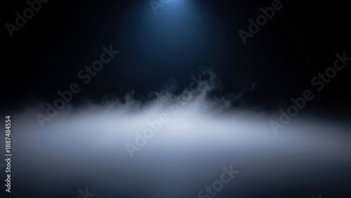 Mysterious foggy ground with a single blue spotlight beam from above