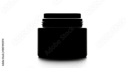 A simple, high-resolution studio shot of a black plastic container with a threaded cap, isolated on a white background, showcasing its minimalist design and potential for packaging applications