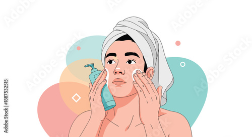 Young man with a towel wrapped around his head applying cleansing product to his face with a cotton pad, focusing on skincare and hygiene.