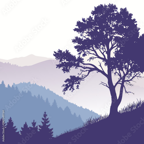 Silhouette of a tree in a mountainous landscape