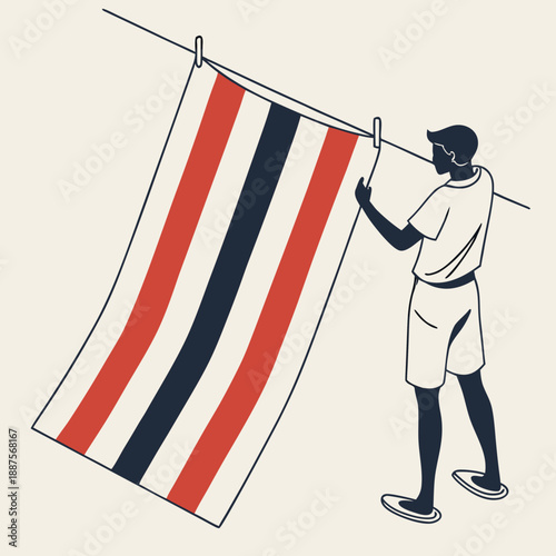 Person hanging a striped flag