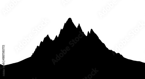 A majestic mountain peak silhouette against a clear sky viewpoint from a distance