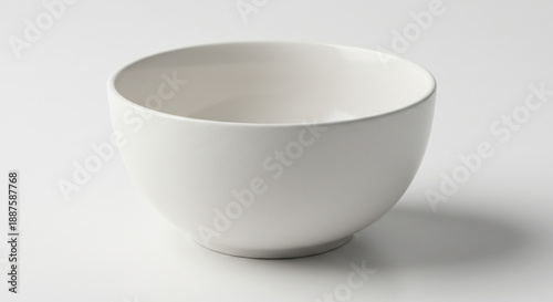 Bol en c�ramique blanc �clatant moderne une ombre douce se projette sur le fond clair minimaliste. AI Generated
