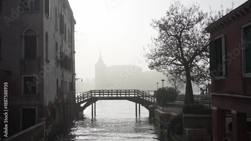 Wallpaper Mural Foggy morning in Venice, Italy. Old venetian architecture and bridge on the canal. Beautiful winter cityscape. Famous travel destination
 Torontodigital.ca