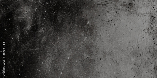 A dark and textured background with grainy details and subtle variations in shades of gray and white