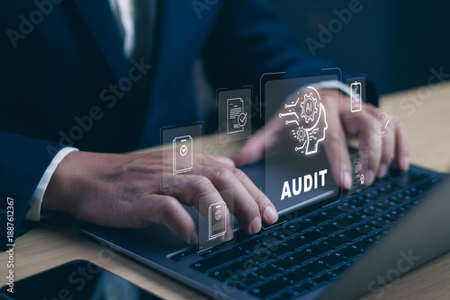 AI audit concept ,businessman working on laptop with artificial intelligence interface, representing digital compliance, automated auditing,data analysis, corporate governance and business technology