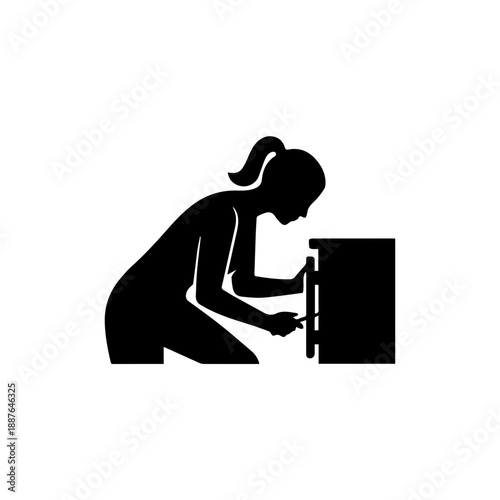 Woman fixing cabinet hinge silhouette. Solid black shape vector illustration. DIY home repair and furniture maintenance concept. Isolated on white background