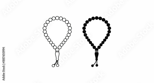 Two prayer beads, one silver and one black, with tassels, on a white background, illustrating rosary or mala accessories.