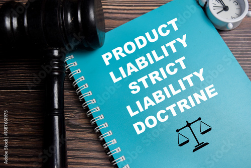 фотографія Concept of product liability strict liability doctrine write on book isolated on Wooden Table