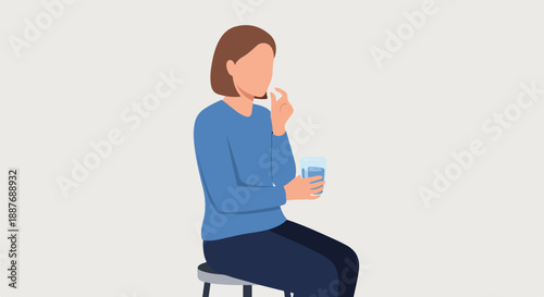 Woman Taking Medication with Glass of Water