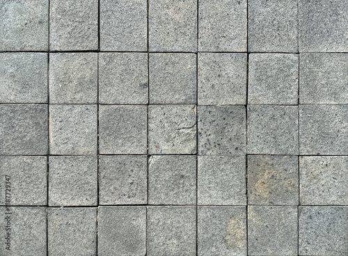 Foto Square grey paving outdoor stone tiles with random shades and roughness