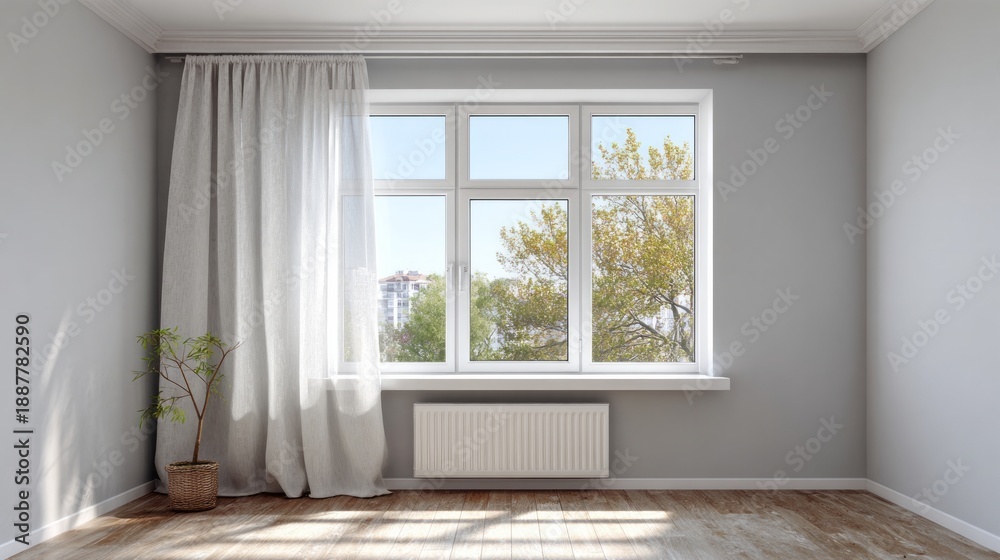 Fototapeta premium Empty room interior with large window and sheer curtains.