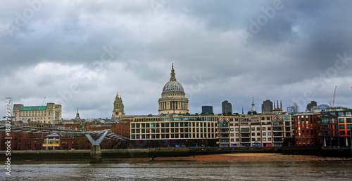 Obraz na plátne Landscape view of St Pauls Cathedral taken from South Bank across the River Thames, with the Millennium Pedestrian Bridge spanning the river